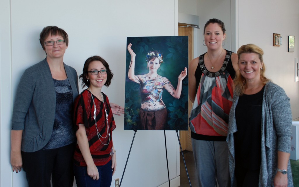 Proudly showcasing one of the images that will be available to view at The Butterfly Story Gala on Friday, September 25 are (l-r) Shannon Bolton (Thunder Bay Breast Cancer Support Group), Chantal Hughes Ouellette (Makeup Artist), Michelle Blackburn (The Butterfly Story Gala Committee Member) & Isabela Pioro (Photographer). Image displayed is of Shannon.