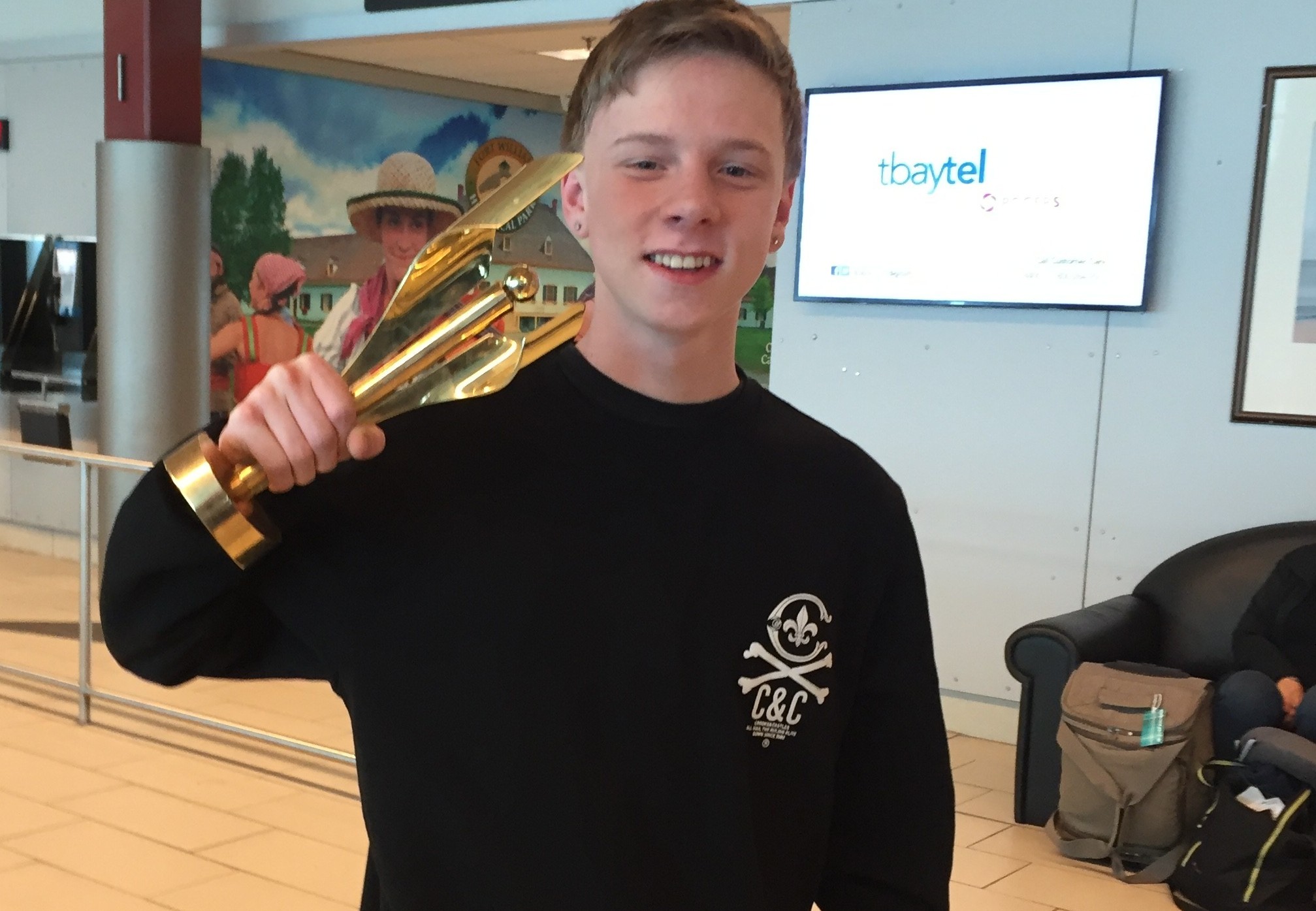 Serino upon arrival at the Thunder Bay airport with his newly minted Canadian Screen Award