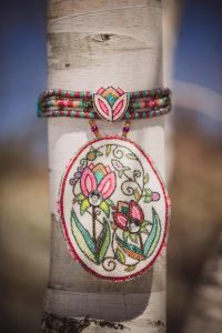 Always With Me, Celeste Pedri-Spade, 2014, beaded pow wow choker with photograph findings. Photo by Rebecca Bose 